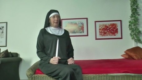 German nun with Priest in Church